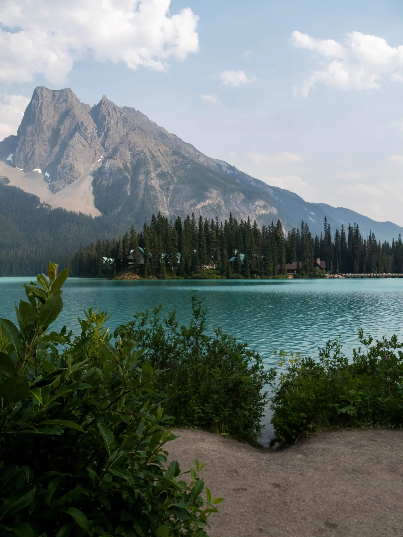 emerald lake with mountain and forest in Canada
